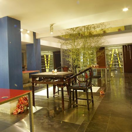 China Community Art Habitat Hotel Qingdao Bagian luar foto