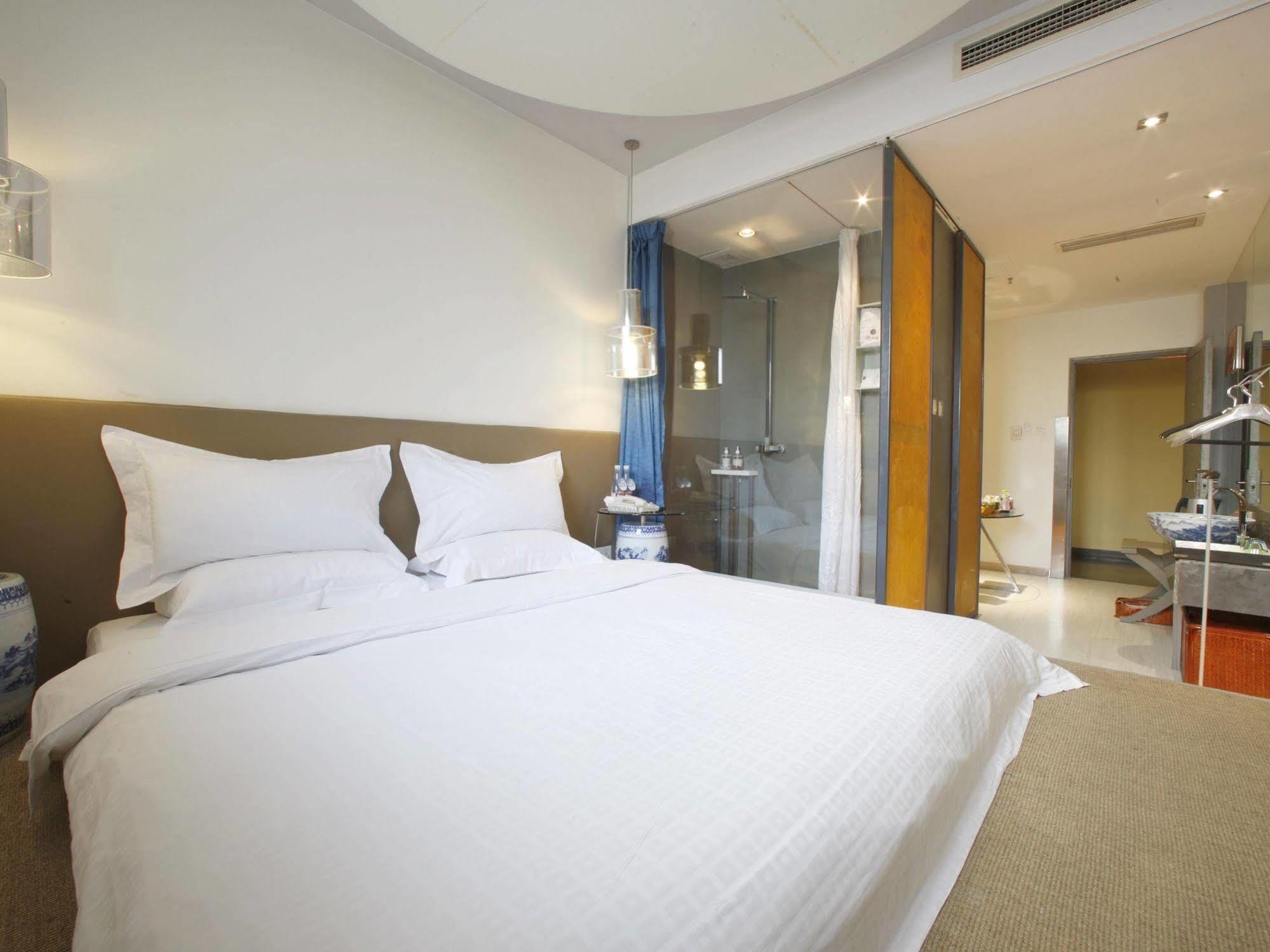 China Community Art Habitat Hotel Qingdao Bagian luar foto