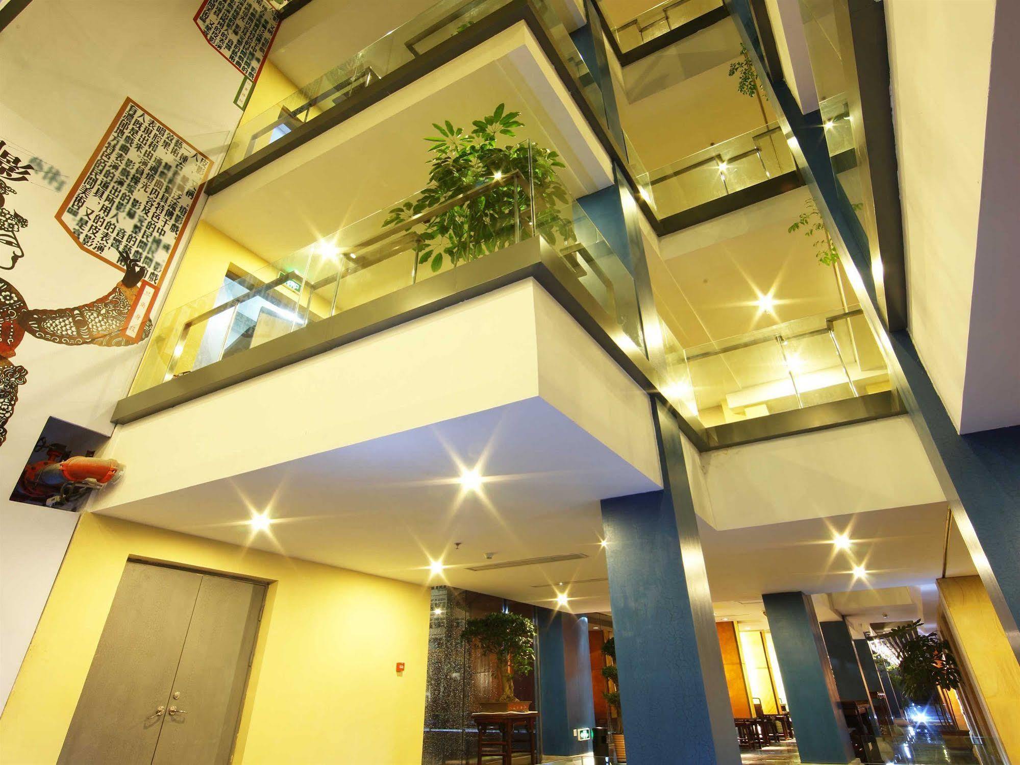 China Community Art Habitat Hotel Qingdao Bagian luar foto