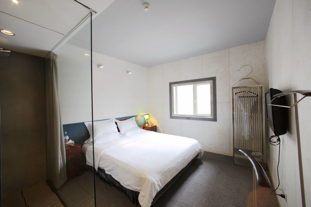 China Community Art Habitat Hotel Qingdao Bagian luar foto