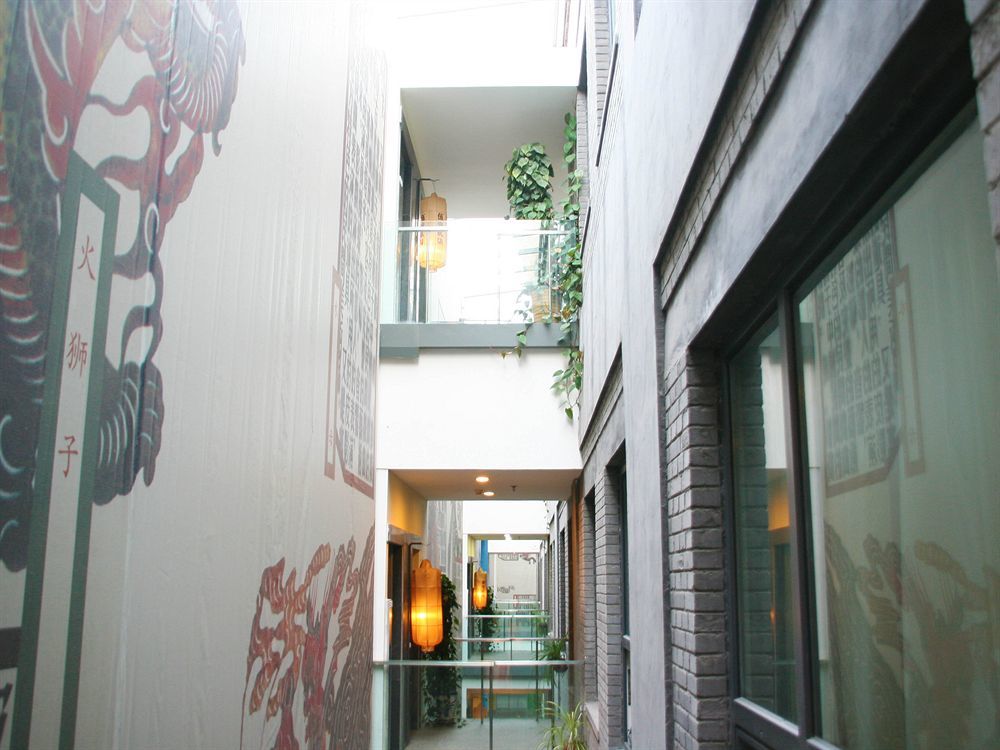 China Community Art Habitat Hotel Qingdao Bagian luar foto