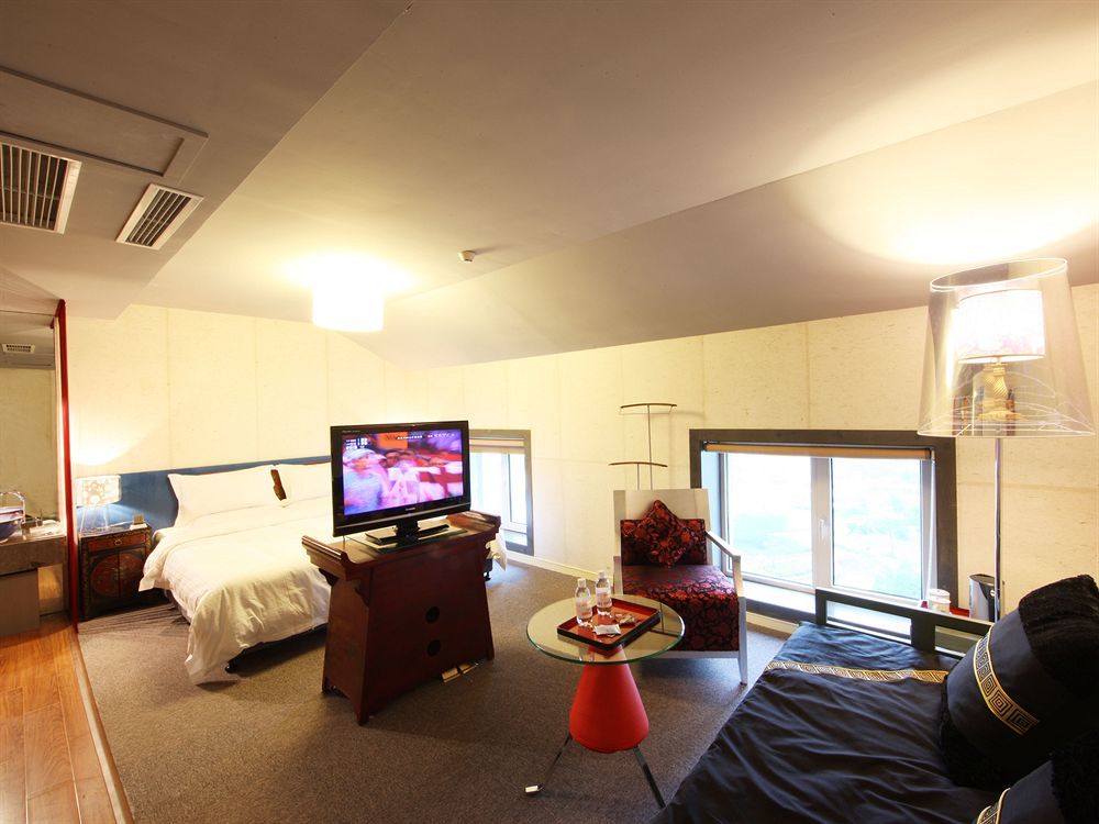 China Community Art Habitat Hotel Qingdao Bagian luar foto