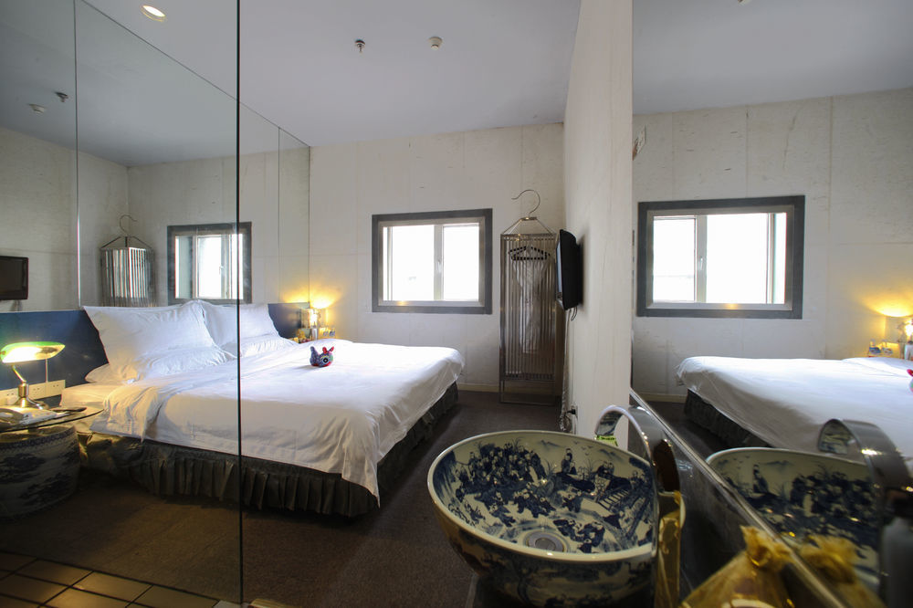 China Community Art Habitat Hotel Qingdao Bagian luar foto